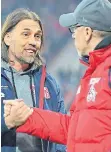  ?? FOTO: DPA ?? Friedliche­s 0:0: Die Trainer Martin Schmidt (l.) und Peter Stöger.