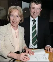  ??  ?? Editor Noreen Meaney signs a copy for newly elected TD Andrias Moynihan.