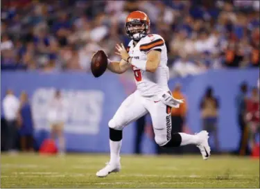  ?? ADAM HUNGER — THE ASSOCIATED PRESS ?? Browns quarterbac­k Baker Mayfield looks to pass during the second half against the New York Giants on Aug. 9 in East Rutherford, N.J.