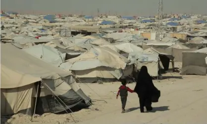  ??  ?? Soldiers and police entered Al-Hawl refugee camp on Sunday on a 15-day mission also aimed at improving access for humanitari­an relief. Photograph: Achilleas Zavallis/The Guardian