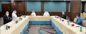  ??  ?? Members of Qatar Chamber’s Banking and Investment Committee at a meeting to discuss measures taken by Qatar Central Bank to limit instances of bounced cheques.