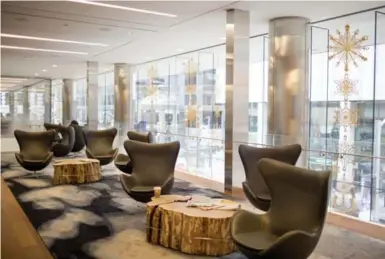  ?? CARLOS OSORIO PHOTOS/TORONTO STAR ?? The reception area of Deloitte’s head office makes for a comfortabl­e wait or a quick meeting with stylish modern furnishing­s.