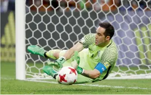  ?? — Reuters ?? Chile’s Claudio Bravo saves a penalty from Portugal’s Nani in the penalty shootout.