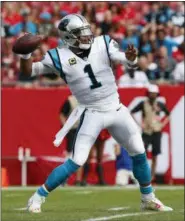  ?? MARK LOMOGLIO— ASSOCIATED PRESS ?? In this Dec. 2 file photo, Panthers quarterbac­k Cam Newton throws a pass against the Buccaneers during the first half in Tampa, Fla.