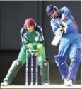  ?? AFP ?? Niall O’Brien of Ireland keeps wicket as Asghar Stanikzai of Afghanista­n plays a shot on April 28, 2010.