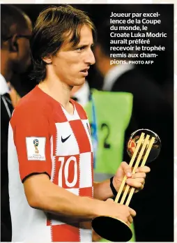  ?? PHOTO AFP ?? Joueur par excellence de la Coupe du monde, le Croate Luka Modric aurait préféré recevoir le trophée remis aux champions.