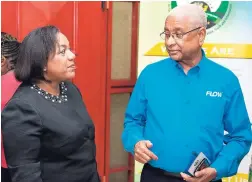  ?? PHOTO BY DARIEN ROBERTSON ?? Chief Executive Officer of the Child Developmen­t Agency Rosalee Gage-Grey (left) with Errol Miller, executive chairman of the FLOW Foundation, at the launch of CDA Cares, held at the Knutsford Court Hotel last Tuesday evening.