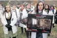  ??  ?? SEEKING TRUTH: Activists in Washington on Wednesday demand a probe into an October strike on the MSF hospital in Kunduz.