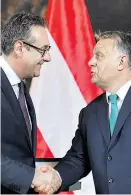  ?? Foto: APA / Hans Punz ?? Hand in Hand gegen das EU-Parlament: Heinz-Christian Strache und Viktor Orbán. Brüssel/Wien