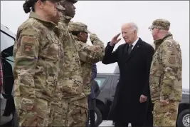  ?? ALEX BRANDON — THE ASSOCIATED PRESS ?? President Joe Biden greets service members after arriving at Dover Air Force Base, Del., Friday.