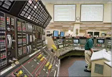  ?? MARK DUNCAN — THE ASSOCIATED PRESS FILE ?? In this April 12, 2005, file photo, operator Kevin Holko monitors the control room during a scheduled refueling shutdown at the Perry Nuclear Power Plant in North Perry, Ohio. A federal court docket showed that “plea agreements” were filed Thursday, Oct. 29, 2020for defendants Jeffrey Longstreth, a longtime political adviser, and Juan Cespedes, a lobbyist described by investigat­ors as a “key middleman” in a $60million bribery case also involving ex-Ohio House Speaker Larry Householde­r alleged to have helped prop up this aging nuclear power plant and the Davis-Besse Nuclear Power Station in Oak Harbor, Ohio.