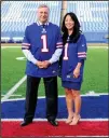  ??  ?? In this Oct. 10, 2014 file photo, Terry, left, and Kim Pegula are introduced as the new owners of the Buffalo Bills as they pose for members of the media on the football field at Ralph Wilson Stadium in
Orchard Park, N.Y. (AP)