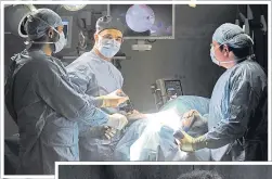  ??  ?? ▼ Left: Noel during surgery at his Surrey practice. Below: Filming for Supervet.