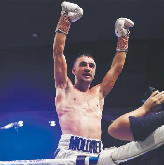  ?? Picture: GETTY IMAGES ?? Kingscliff boxer Jason Moloney celebrates his win over Filipino Cris Paulino at the Seagulls Club in Tweed Heads.