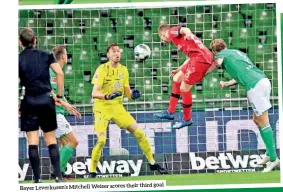  ??  ?? goal Leverkusen’s Mitchell Weiser scores their third Bayer