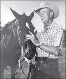  ?? Photo courtesy of Wendy Rice Peterson ?? Harold “Oskie” Rice stands with his favorite horse Blackjack in this photo taken in1960.