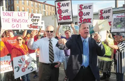  ?? File photo by Ernest A. Brown ?? PawSox executive Mike Tamburro and Pawtucket Mayor Donald Grebien lead a September rally that exhorted state leaders to commit to participat­ing in the financing of a new ballpark that would keep the in the city for the next 30 years.