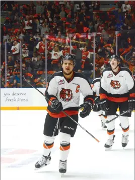  ?? NEWS PHOTO RYAN McCRACKEN ?? Medicine Hat Tigers captain Clayton Kirichenko skates back to the bench after scoring his first career playoff goal in Game 1 of the Eastern Conference quarterfin­als against the Brandon Wheat Kings, Friday at the Canalta Centre.