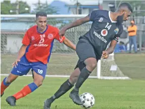  ?? Photo: Waisea Nasokia ?? Ba’s Samuela Drudru in control against Navua’s Matthew Charitar during the Vodafone Premier League at Fiji FA academy, Ba on July 11, 2020.