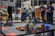  ?? BRIANA CONTRERAS — THE MORNING JOURNAL ?? One of three Longfellow Middle School robotics teams of Lorain competes Feb. 16 during the third annual Lorain Titans VEX Qualifier at Lorain High School.