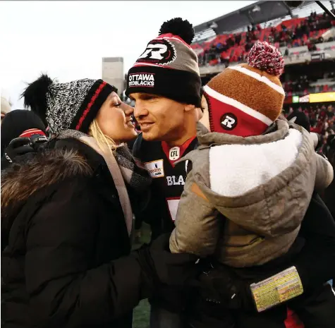  ?? JUSTIN TANG/THE CANADIAN PRESS ?? Redblacks QB Trevor Harris gets a kiss from his wife Kalie after Sunday’s CFL East Division Final against the Hamilton Tiger-Cats. Whatever line the oddsmakers set will disrespect the Redblacks when they take on the Calgary Stampeders in the final, Don Brennan says.