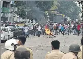  ?? BACHCHAN KUMAR/HT ?? Protesters pelt stones at police personnel at Kopar Khairane in ▪Navi Mumbai on Wednesday.