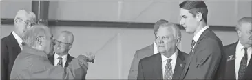  ??  ?? Kevin Myrick /
Former Aragon Mayor Ken Suffridge talks to Gov. Nathan Deal and Rep. Trey Kelley prior to the start of an event at the Polk County Airport on Friday morning for the governor to sign the amended 2018 state budget. PSJ