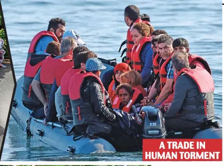  ?? ?? A TRADE IN HUMAN TORMENT
Perilous journey: Migrants crossing the Channel in an inflatable boat last month