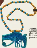  ??  ?? JEWELS: A golden chain with a blue ceramic pendant