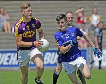  ??  ?? Centre-back Ronan Devereux on the move away from Longford’s Iarla O’Sullivan.