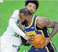  ?? CJ GUNTHER / EFE ?? Desequilib­rio. Lebron James (d) fue clave en la ofensiva de los Lakers.