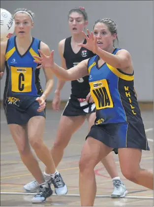  ??  ?? WORKING HARD: Nhill wing-attack Tess Mcqueen in action against Horsham Saints last weekend. The Tigers have a mighty task against Southern Mallee Giants on Saturday. Picture: PAUL CARRACHER