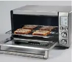  ?? Associated Press ?? The Breville Smart Oven Pro. This electric convection oven can roast a chicken, bake bread and cookies and still makes great toast.