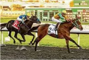  ?? Vassar Photograph­y ?? Chase The Chaos, with jockey Armando Ayuso up, wins the El Camino Real Derby in Albany.