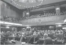  ?? GRACE HOLLARS/INDYSTAR ?? Lawmakers fill the House of Representa­tives chambers on Jan. 9 during the State of the State address at the Statehouse in Indianapol­is.