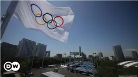  ??  ?? Olympic flag flutters at the Ariake Tennis Park in Tokyo