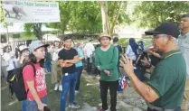  ??  ?? Abdul Rahim explains the various tapir species to members of the media to create more awareness.