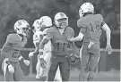  ?? BOB SELF/FLORIDA TIMES-UNION ?? Mandarin’s Hylton Stubbs celebrates an intercepti­on against Atlantic Coast.