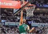  ?? SAM NAVARRO/USA TODAY SPORTS ?? Celtics forward Jayson Tatum shoots against the Heat during Game 6 of the Eastern Conference finals Saturday in Miami.