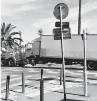  ?? BORIS HORVAT/AFP/GETTY IMAGES ?? The truck that was driven through a crowd celebratin­g Bastille Day in Nice, France, is towed away.