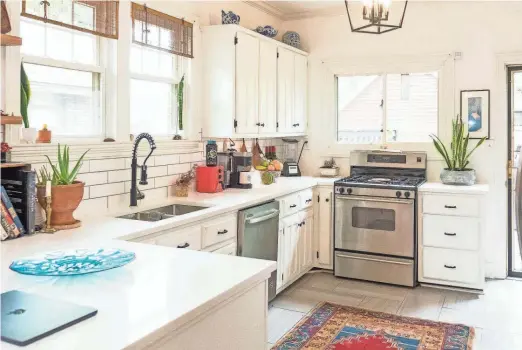  ?? ?? The kitchen looks modernized with stainless steel appliances.