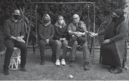  ?? MARCIO JOSE SANCHEZ/AP ?? Nicholas Philbrook, left, with daughters Alexis, Ava, father-in-lawRaymond, son Andrew, and wife, Heather, in Camarillo, California. Philbrook and his wife have been trying to convince court officials that he should be excused from jury duty because Raymond, who is at high risk for COVID-19, lives with them.