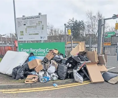  ?? Picture: Neil Henderson. ?? The piles of rubbish left outside Cupar recycling site by fly-tippers.