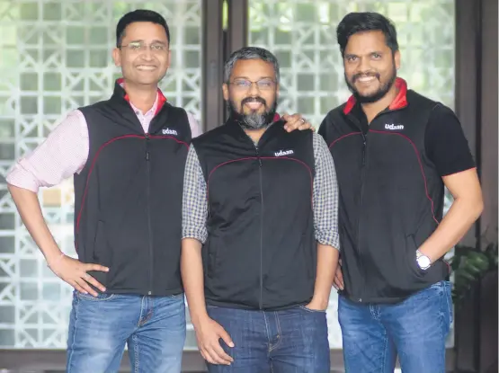  ?? ?? (From left to right): Udaan founders Amod Malviya, Vaibhav Gupta and Sujeet Kumar. The trio, all from small towns, wanted to build for ‘middle India’.