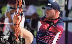  ?? Shuji Kajiyama / Associated Press ?? Matt Stutzman of the U.S. holds the bow with his foot as he competes at the Tokyo 2020 Paralympic Games on Friday.