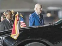  ?? (AFP) ?? US President Joe Biden (right) disembarks from Air Force One upon arrival at Ngurah Rai Internatio­nal Airport in Denpasar on the Indonesian resort island of Bali on Sunday.