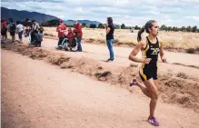  ?? ROBERTO E. ROSALES/JOURNAL ?? St. Pius senior Jacque Piñon finished first at the Academy Cross Country Invitation­al Friday.