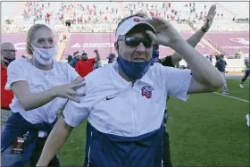  ?? MATT GENTRY — THE ROANOKE TIMES VIA AP ?? Liberty Head Coach Hugh Freeze celebrates after they defeated the Virginia Tech in an NCAA college football game, Saturday, Nov. 7 2020, in Blacksburg, Va.