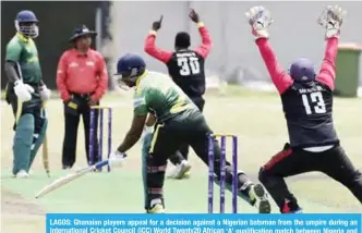  ?? — AFP ?? LAGOS: Ghanaian players appeal for a decision against a Nigerian batsman from the umpire during an Internatio­nal Cricket Council (ICC) World Twenty20 African ‘A’ qualificat­ion match between Nigeria and Ghana in Lagos on Tuesday. The inaugural ICC World...