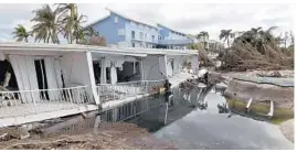  ?? TAIMY ALVAREZ/STAFF PHOTOGRAPH­ER ?? Monroe County, which includes the Florida Keys, has reported six storm-related deaths.